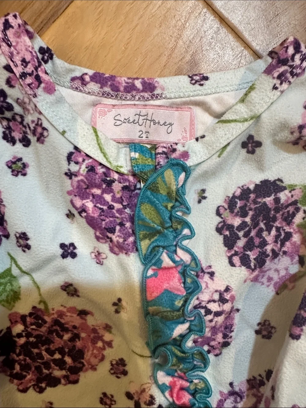SweetHoney Footed One-Piece with Purple Floral Print and Teal Ruffle